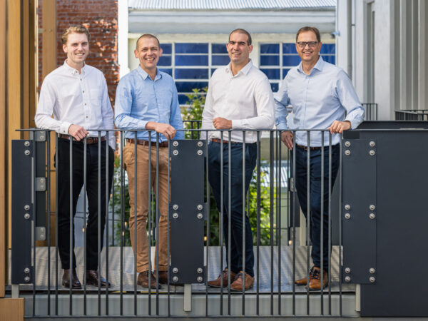 Killarney capital staff standing on a balcony